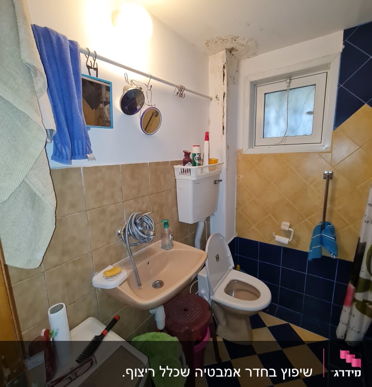 שיפוץ בחדר אמבטיה שכלל ריצוף. 